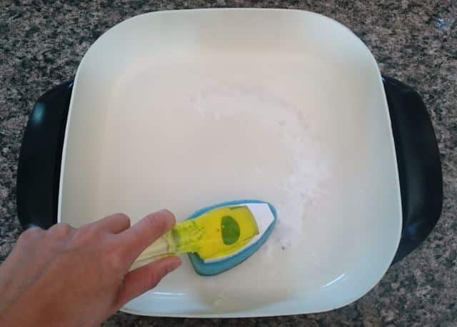 scrubbing an electric skillet