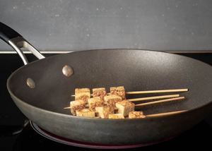 How to Fry Tofu - Step 4 image of frying tofu. inthekitch.net