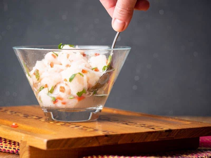 How to Make Ceviche - Step 8 How to Make Ceviche - Step 8 image, mixing the bowl of fish and veg. inthekitch.net