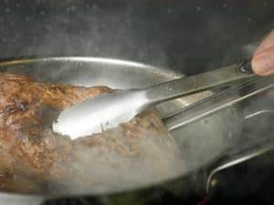 How to Braise Beef - Step 3 image flipping roast. inthekitch.net