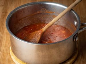 How to Make Ketchup - Step 3 Tomato Paste cooking in a pot - inthekitch.net