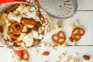 Tri-Flavor Popcorn Snack Mix in an aluminum can.