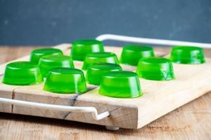 Gummies drying on a cutting board.