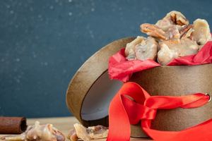 Pralines in a decorative container.
