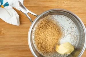 Sugar butter and cream in a pot.