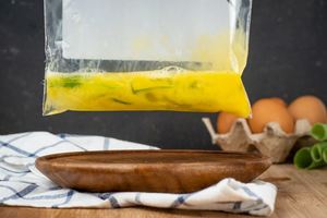 How to Sous Vide Eggs Step 2 Scrambled egg mixed in a plastic bag.
