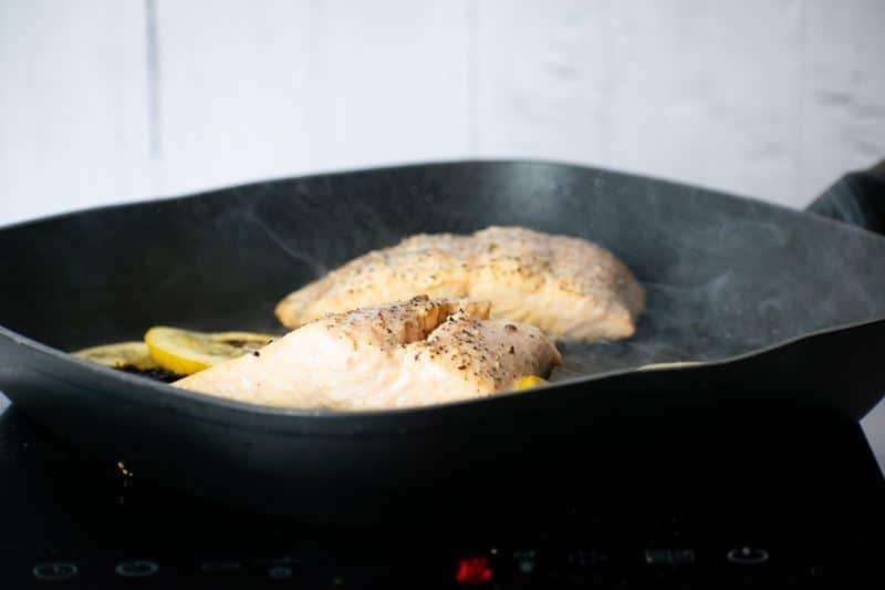 How to Cook Salmon With Skin Step 7 Cooked salmon fillets in pan.