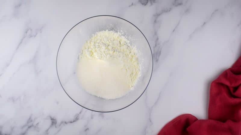 How to Make Mochi Ice Cream 3-2 Sugar and rice flour in a bowl.
