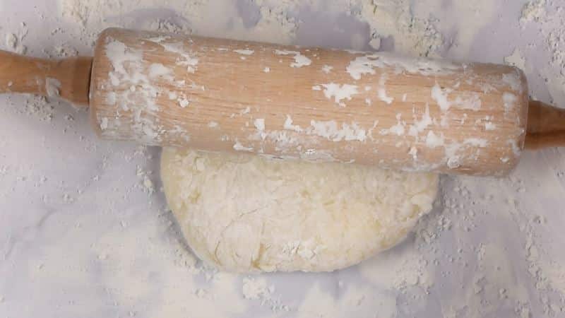How to Make Mochi Ice Cream Step 5 Rolling pin covered in corn starch, rolling out the dough.