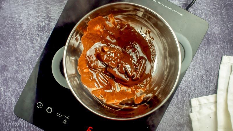Bowl of melted chocolate and butter mixture.