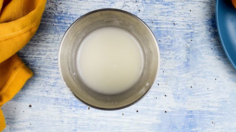 Bowl of icing sugar coating for cake pops.