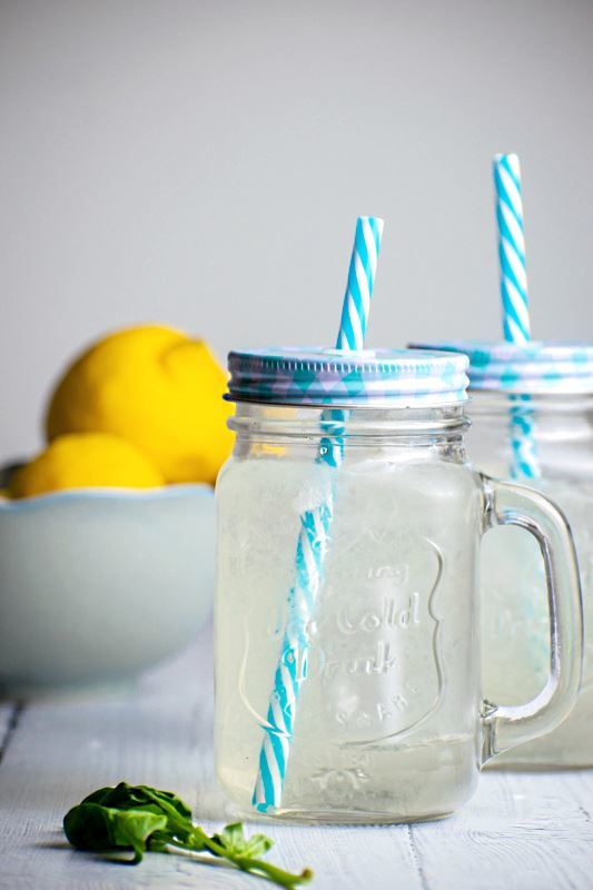 Decorative mason jars filled with lemonade.