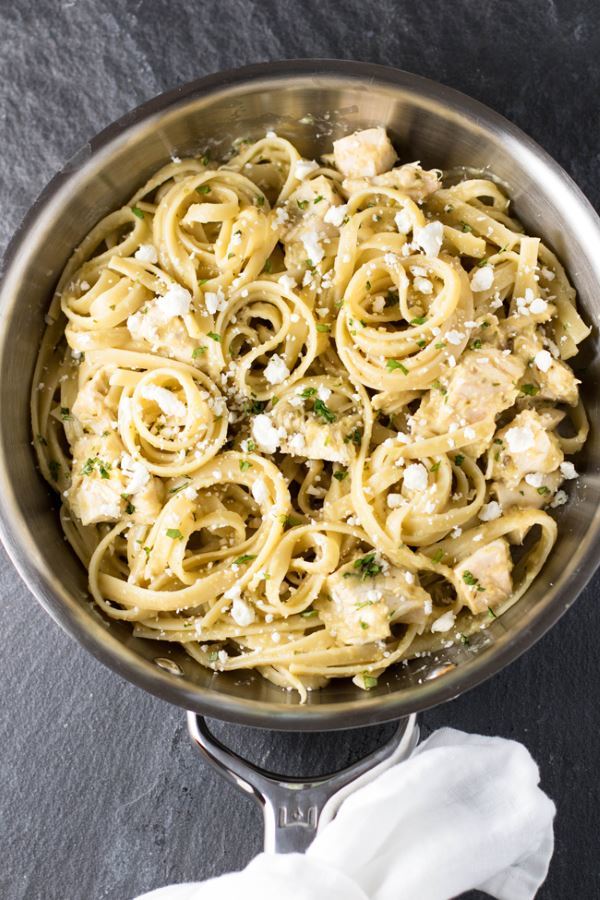 Tomatillo chicken pasta in a pan.