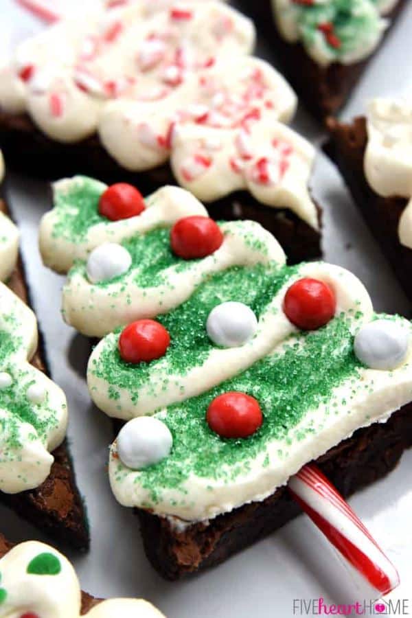 Christmas tree brownie pops on candy canes.