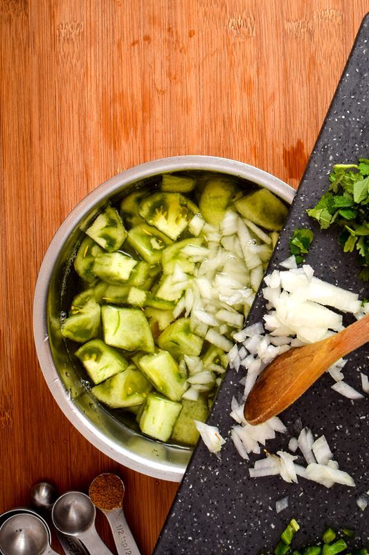 How to Make Tomatillo Salsa_5 Adding onions to pot of water and tomatillos.