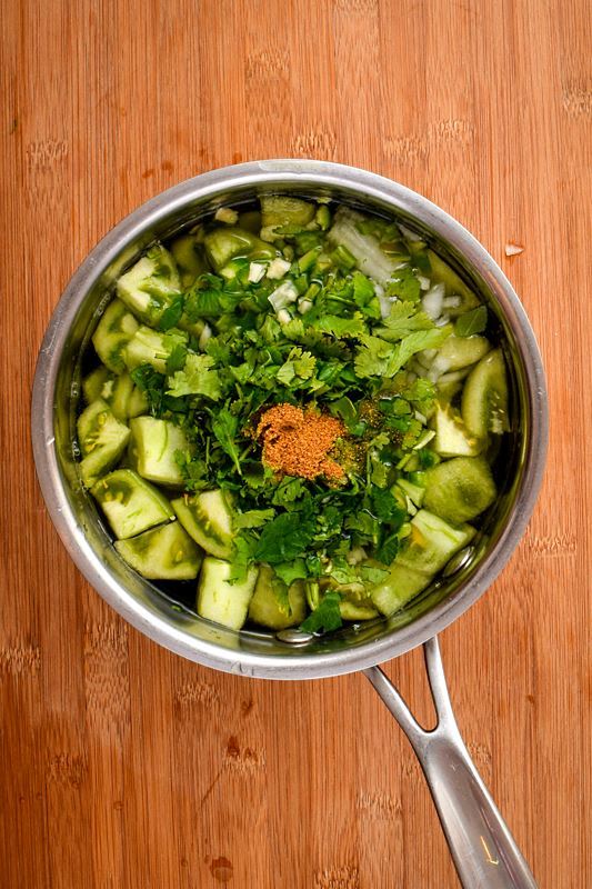 How to Make Tomatillo Salsa_7 All tomatillo salsa ingredients in a pot of water.