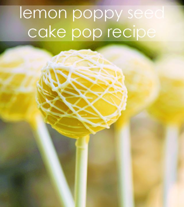 Lemon poppy seed cake pops in yellow frosting and white drizzles.