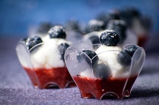 Red White & Blue Layered Fruit & Ice Cream treats in mini cups.