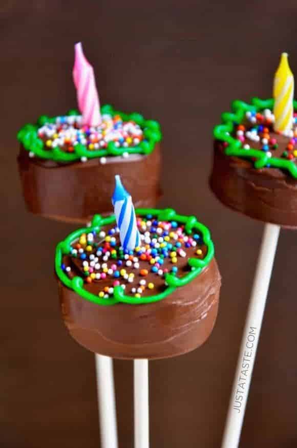 Birthday cake with a candle cake pops.