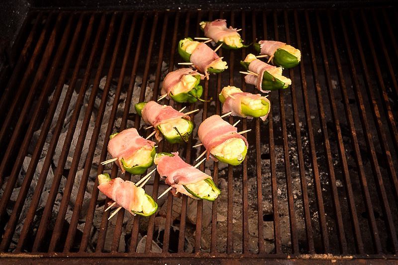 Jalapeno poppers on the BBQ charcoal grill.