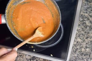 Dark roux in a frying pan.