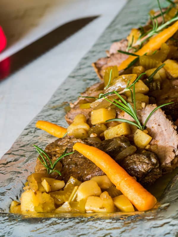 Pot roast with veg on serving platter.