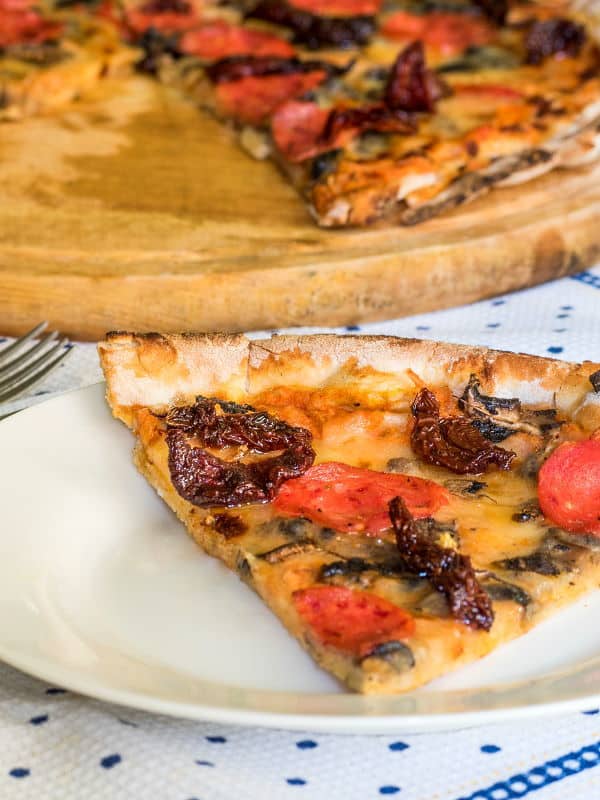 Pizza on a serving board.