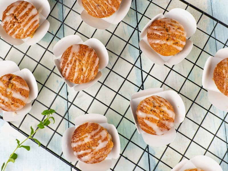 Gluten Free & Vegan Carrot Cupcakes on a wire rack.