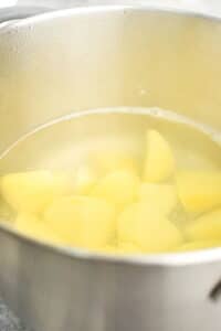 Pot of boiling potatoes.