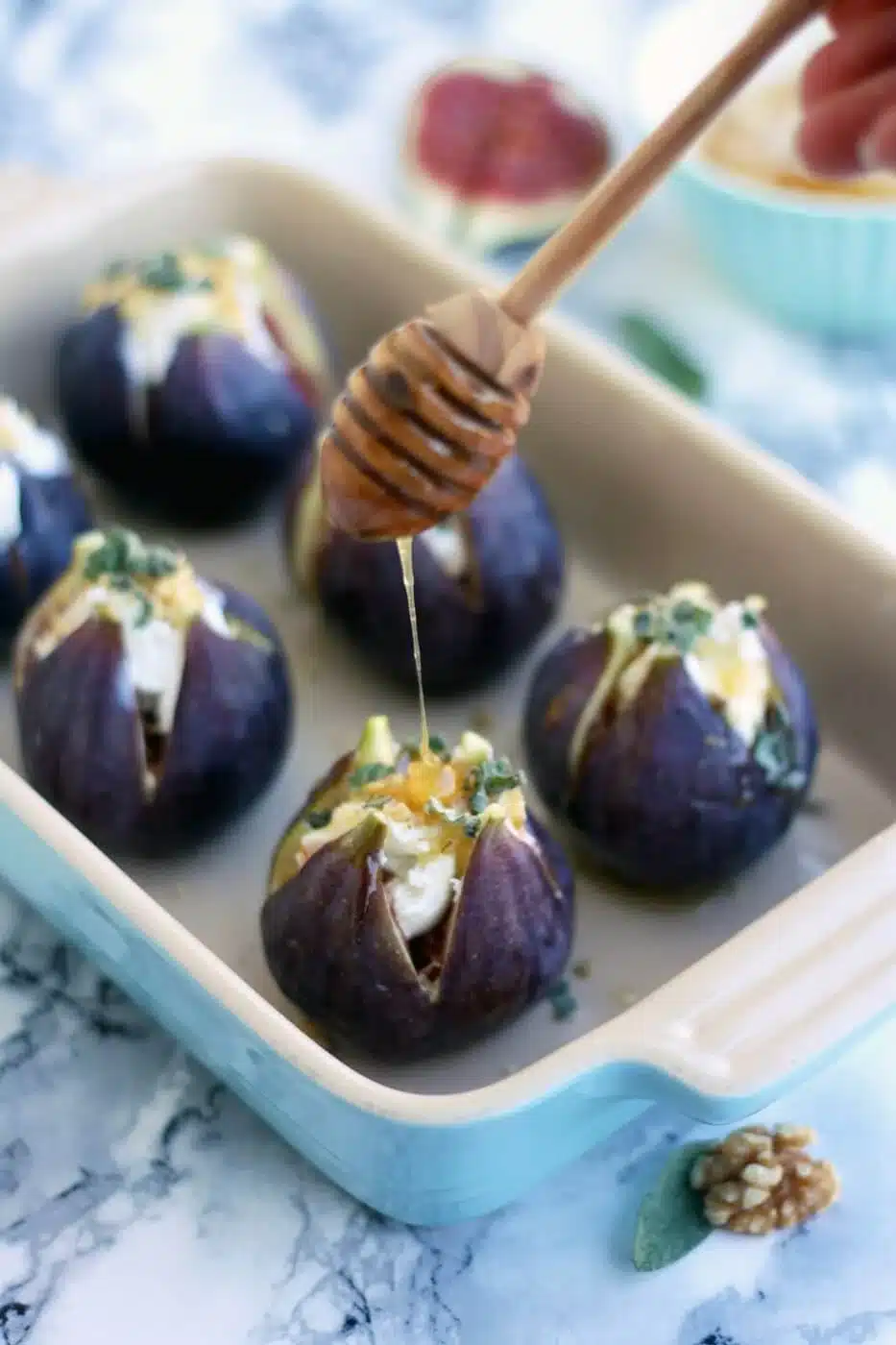 Baked figs with honey drizzling over.