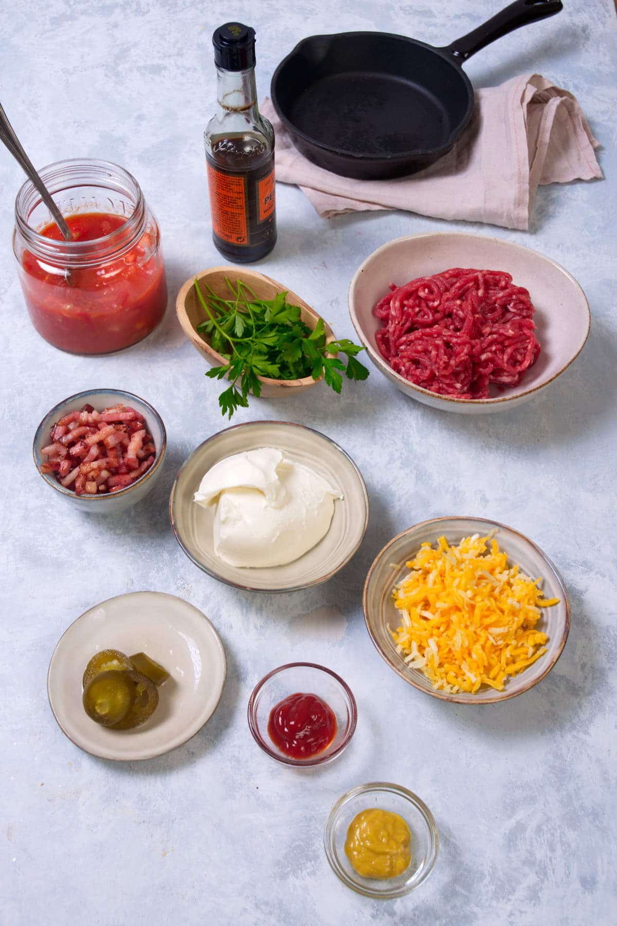 Bison dip ingredients prepped on light background.