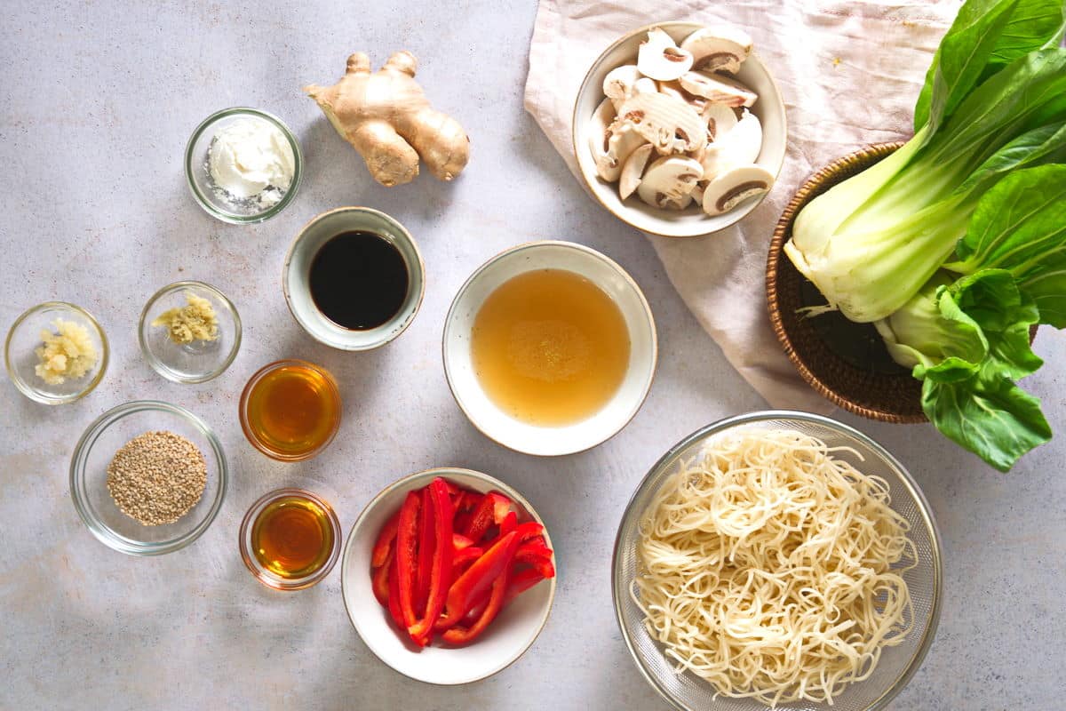 Bok choy stir fry ingredients prepped on light background.