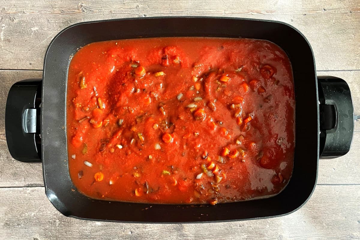 Baked beans tomato sauce in skillet.