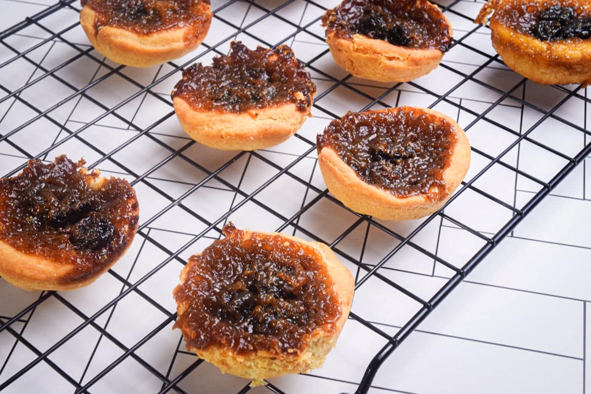 Butter tarts on cooling rack.