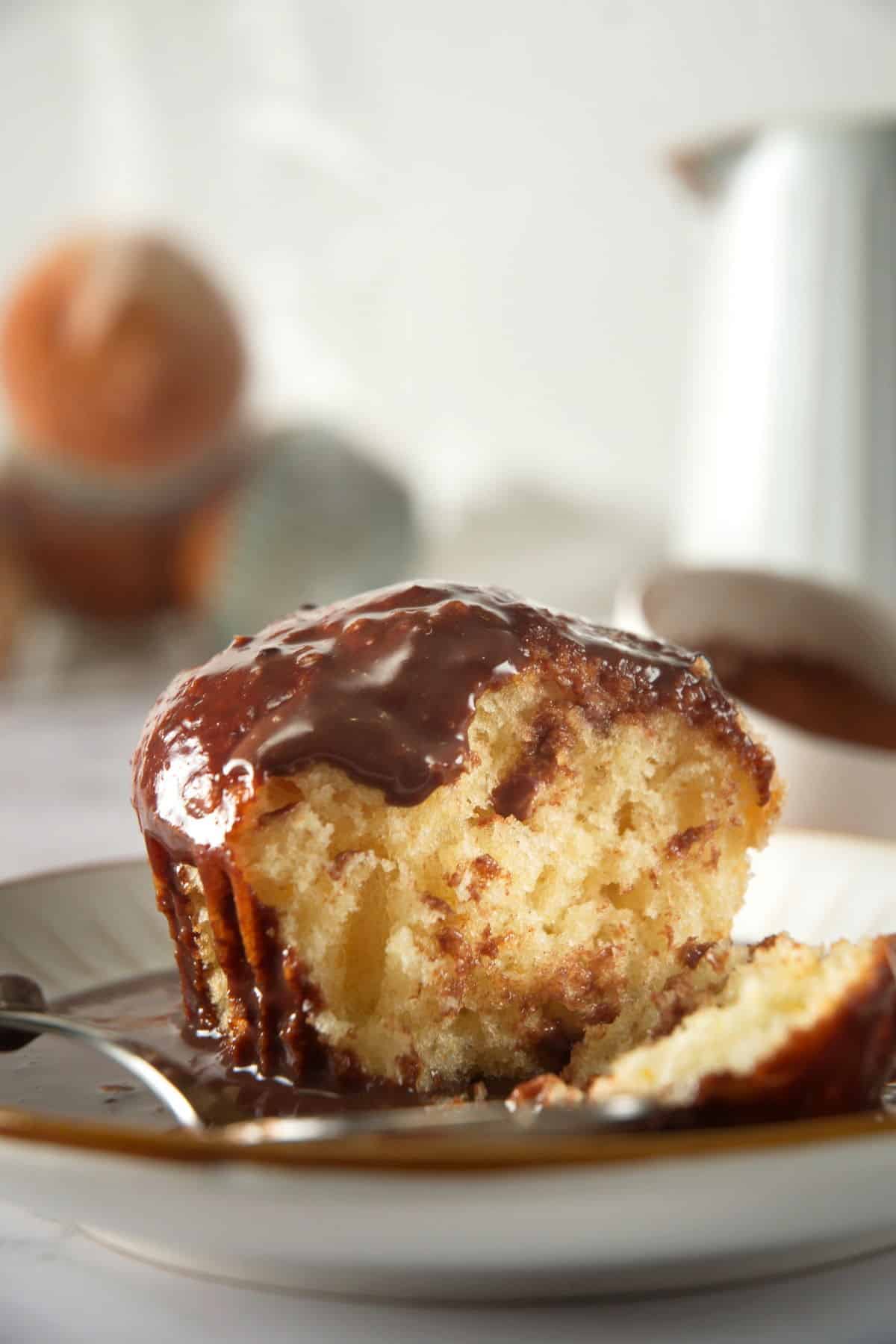 Chocolate gravy drizzled over an open muffin.