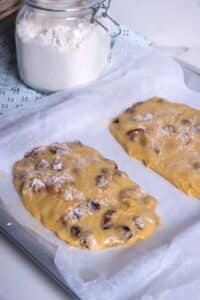 Cranberry biscotti dough on baking sheet.