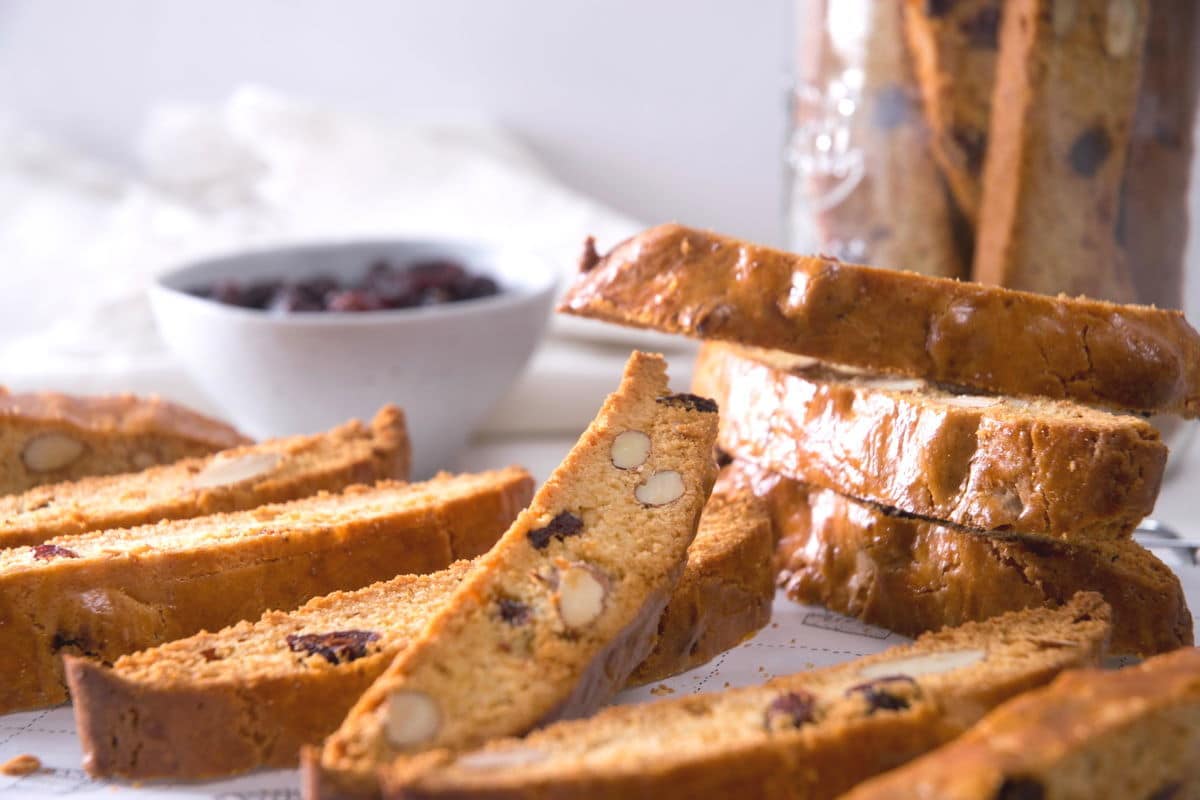 Cranberry biscotti laid out on baking rack.