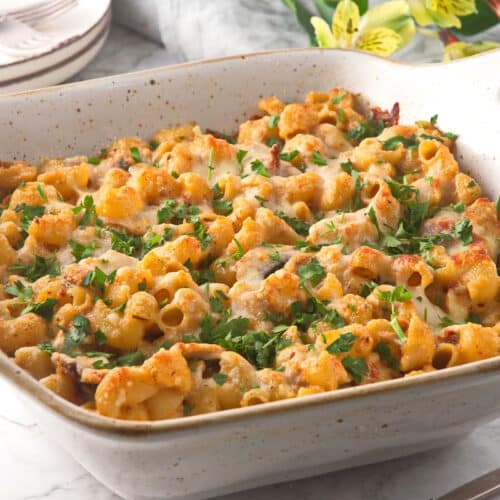 Tuna casserole in casserole dish with marble background.