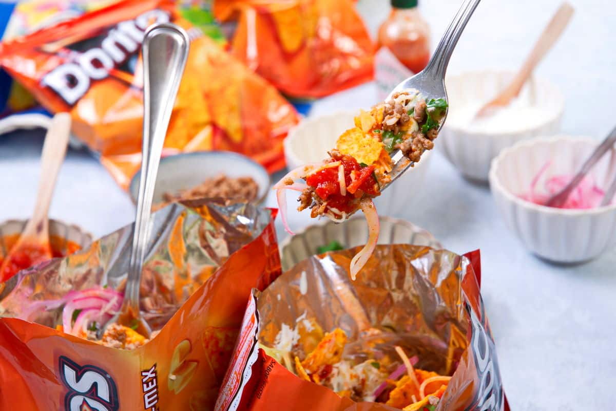 Taco in a bag with forks.