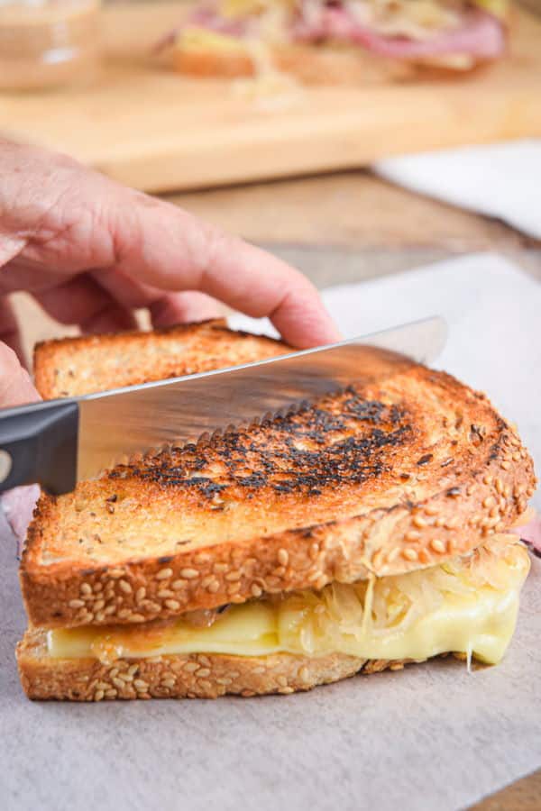 Reuben sandwich and a knife.