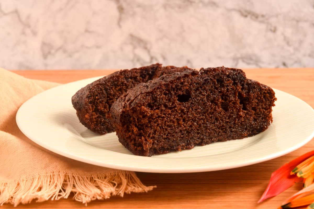 Moist chocolate cake on plate.