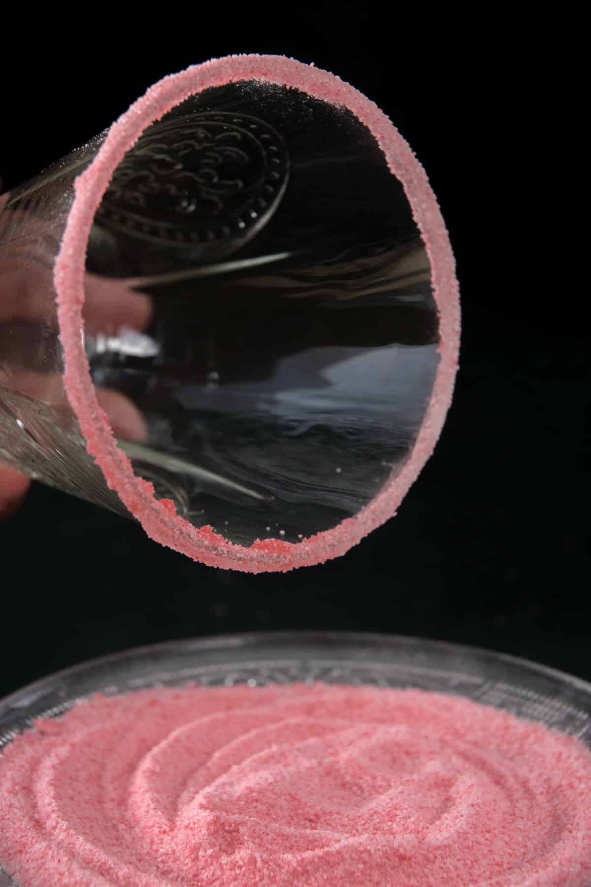 Cocktail glass dipped in pink sugar.