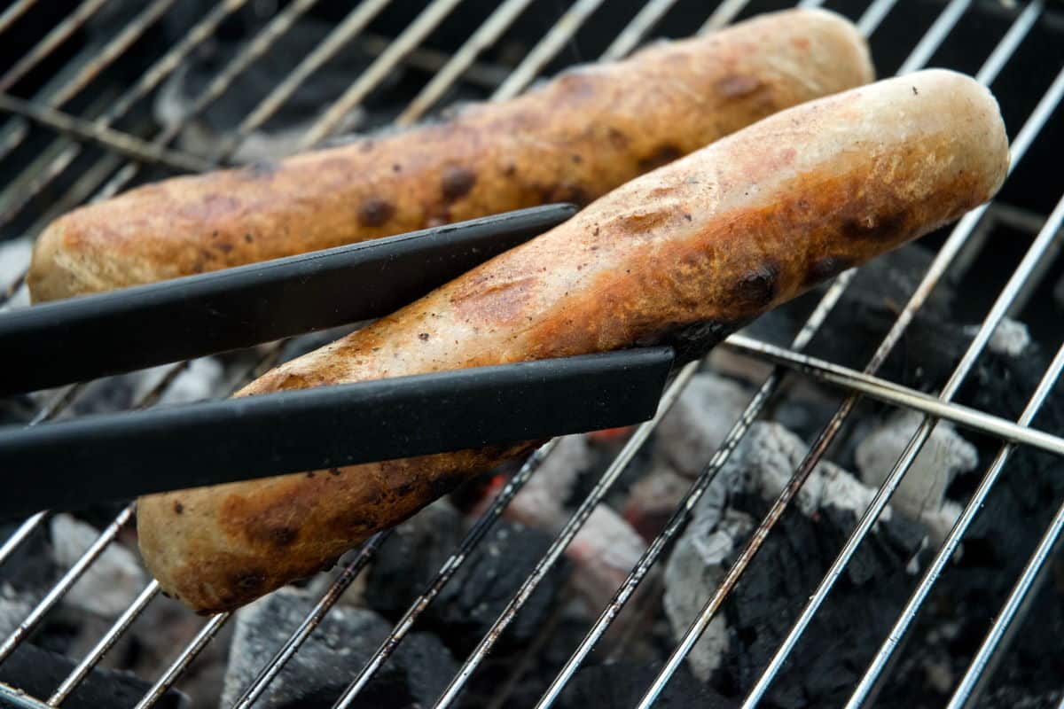 Bratwurst sausages on the grill.