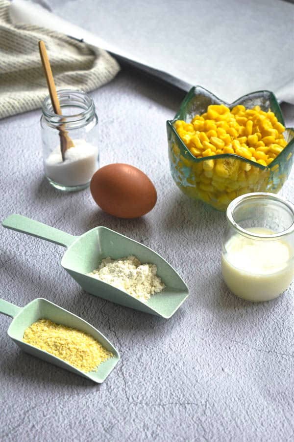 Corn nugget ingredients prepped on a light background.