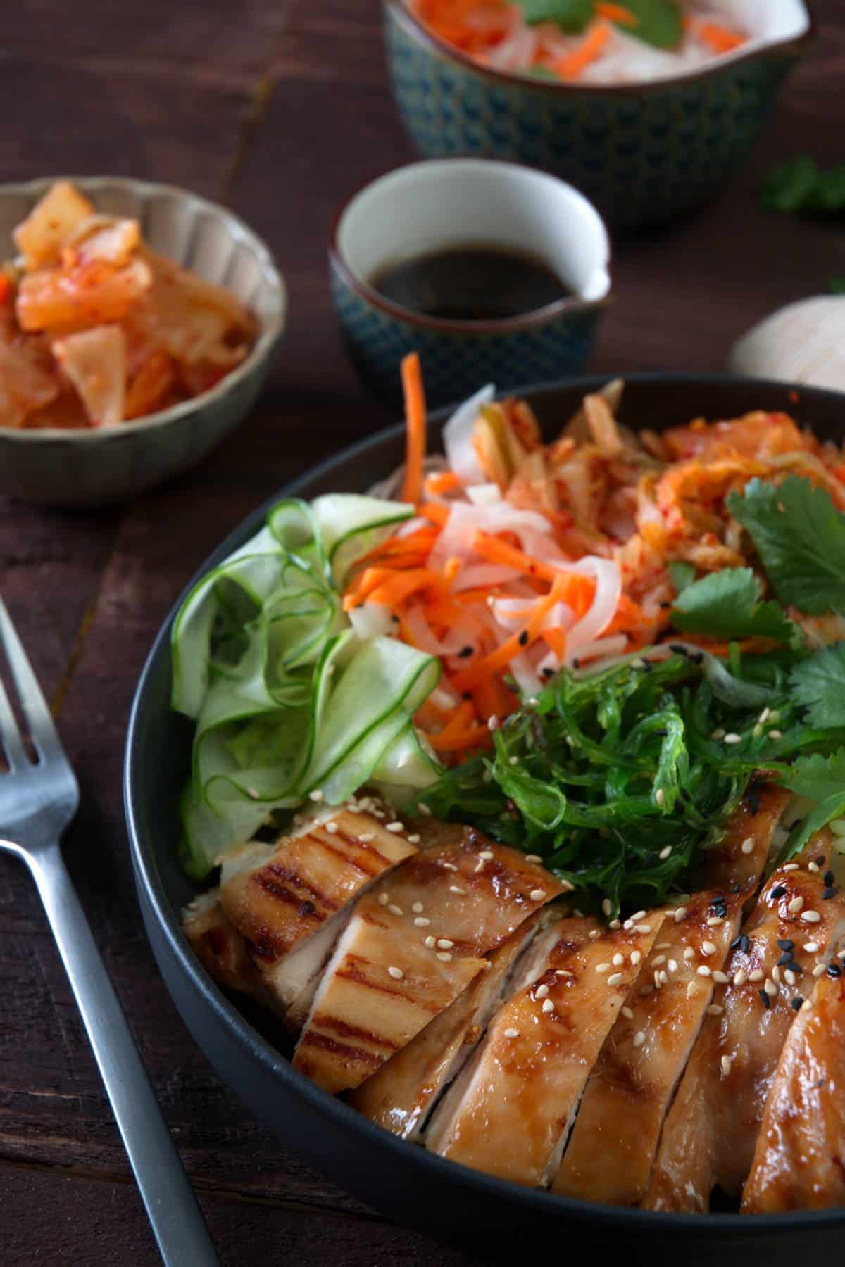 Kimchi rice bowl on wooden background.