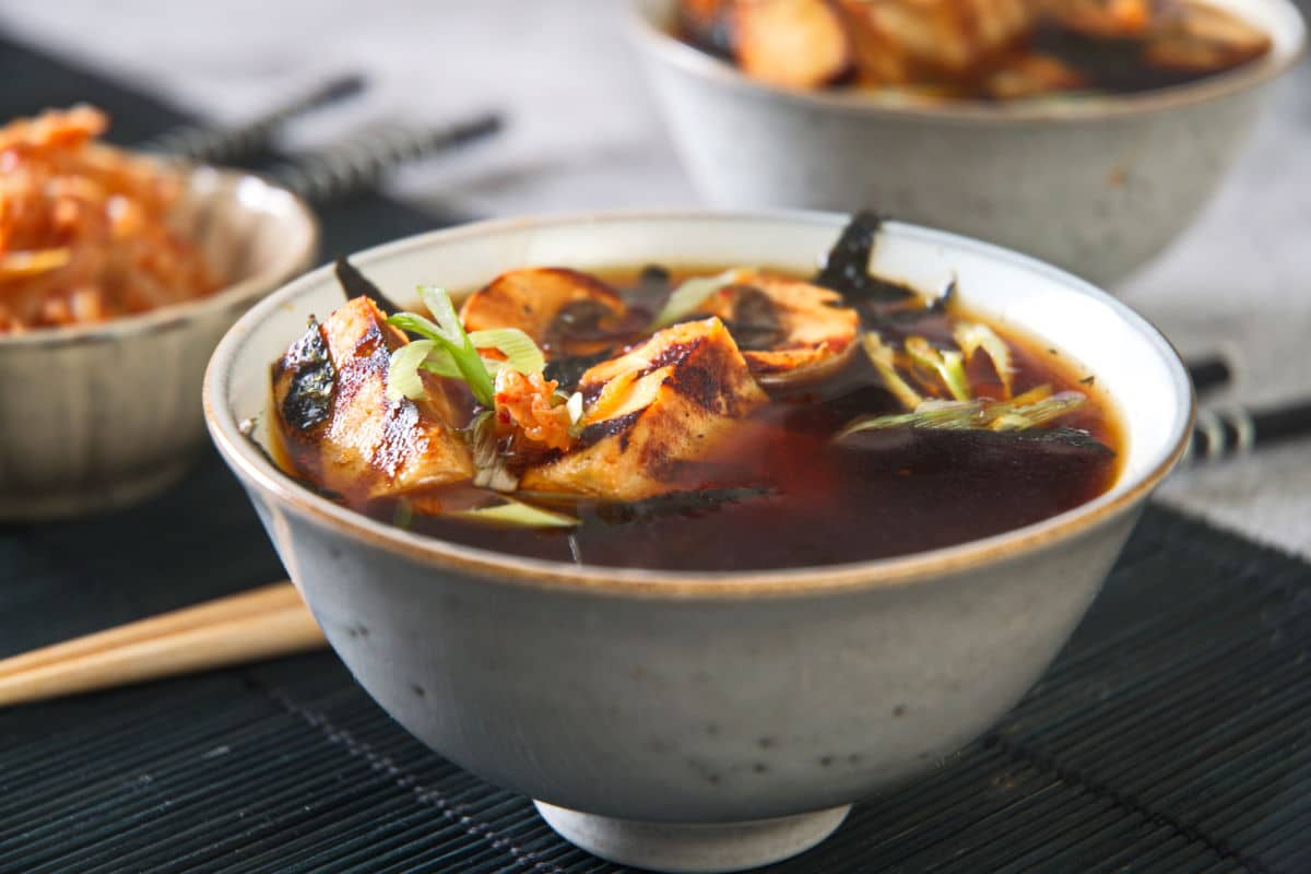 Kimchi tofu soup in a bowl.