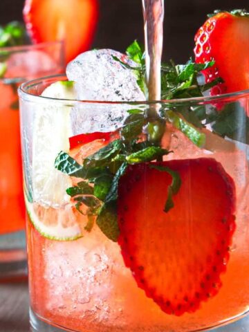 Strawberry mojito mocktail in a glass close up.
