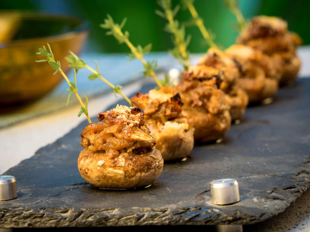 Cheese and herb stuffed button mushrooms.