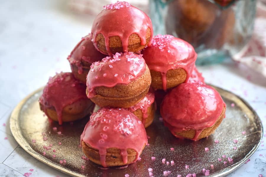 Valentine cake balls on a plate.