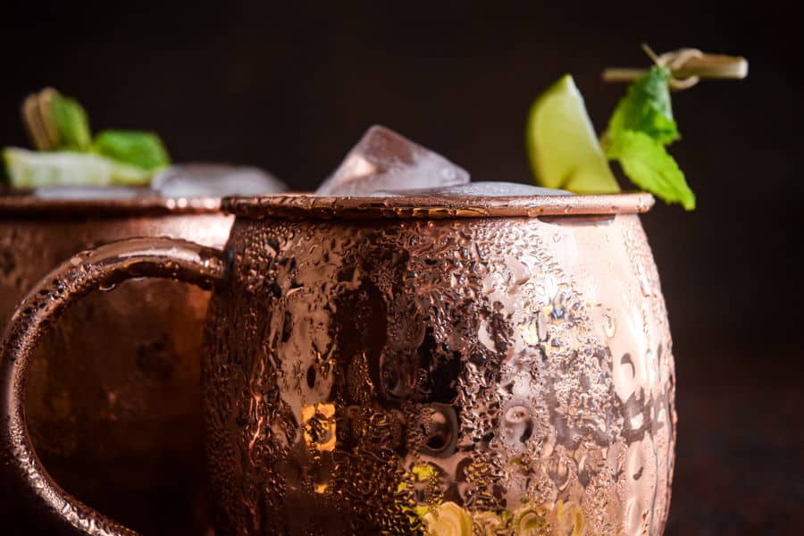 Virgin Moscow Mule in copper mugs, dark background.